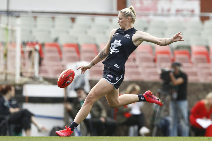 Tayla Harris of the Blues kicks at goal during the AFLW Semi Final match between the Carlton Blues and the Brisbane Lions at Ikon Park on March 22, 2020 in Melbourne, Australia. (Photo by Daniel Pockett/AFL Photos/Getty Images)