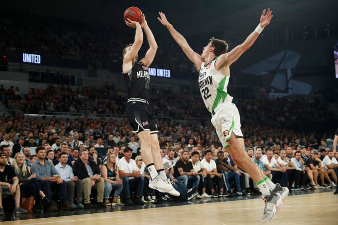 Mitch McCarron of United shoots during the round one NBL match between Melbourne United and the South East Melbourne Phoenix at Melbourne Arena on October 03, 2019 in Melbourne, Australia. (Photo by Daniel Pockett/Getty Images)