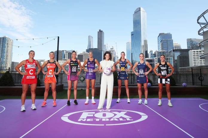 Hannah Hollis and players at the FOX Netball 2022 Launch at Crown Aviary on February 23, 2022 in Melbourne, Australia. (image - Graham Denholm/Getty Images)