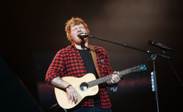 Ed Sheeran performing on stage (image - Ki Price/Getty Images)