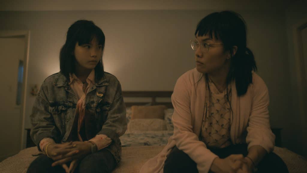 Riley Lai Nelet as Erin Tieng and Ali Wong as Adult Erin Tieng in PAPER GIRLS (image - Prime Video)