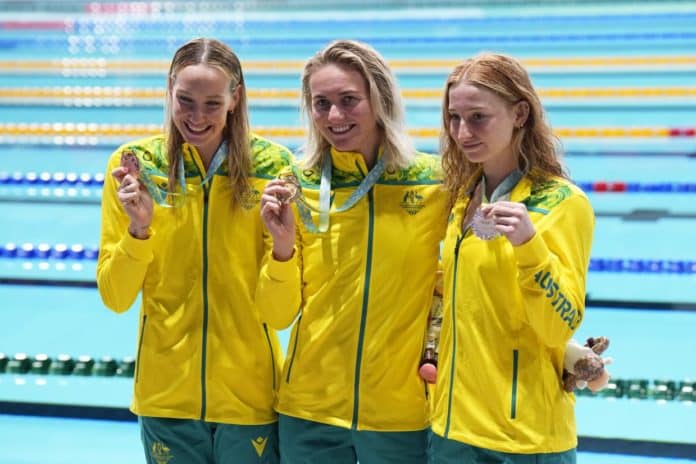Madison Wilson, Ariarne Titmus, and Mollie O'Callaghan - all medalists for Australia at the BIRMINGHAM 2022 COMMONWEALTH GAMES (image - AP Photo/Aijaz Rahi)