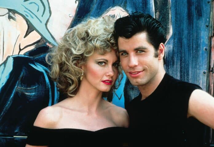 Olivia Newton-John and John Travolta starred in the cult classic film GREASE (image - Paramount Pictures)