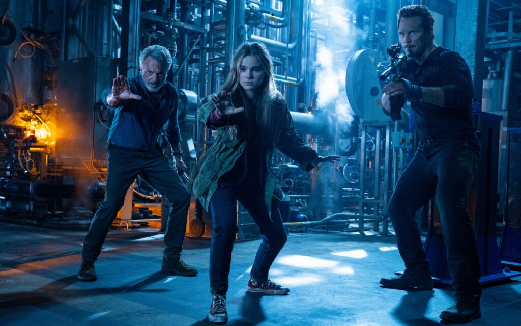 (from left) Dr. Alan Grant (Sam Neill), Maisie Lockwood (Isabella Sermon) and Owen Grady (Chris Pratt) in Jurassic World Dominion, co-written and directed by Colin Trevorrow. (image - Foxtel)